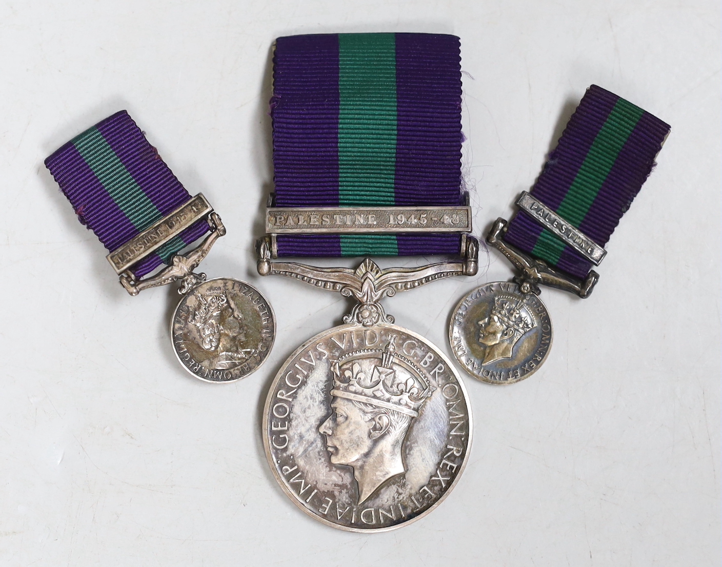 A G.S.M. medal with Palestine clasp and two miniature medals.